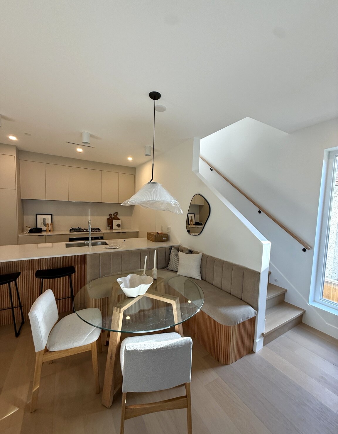 Fluted island and custom upholstered banquette seating