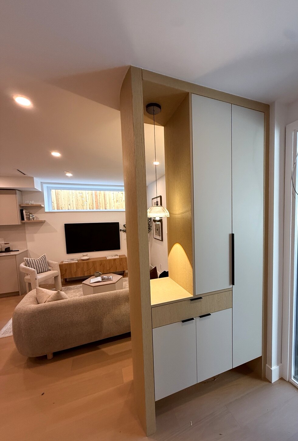 Custom entry cabinet with illuminated display niche