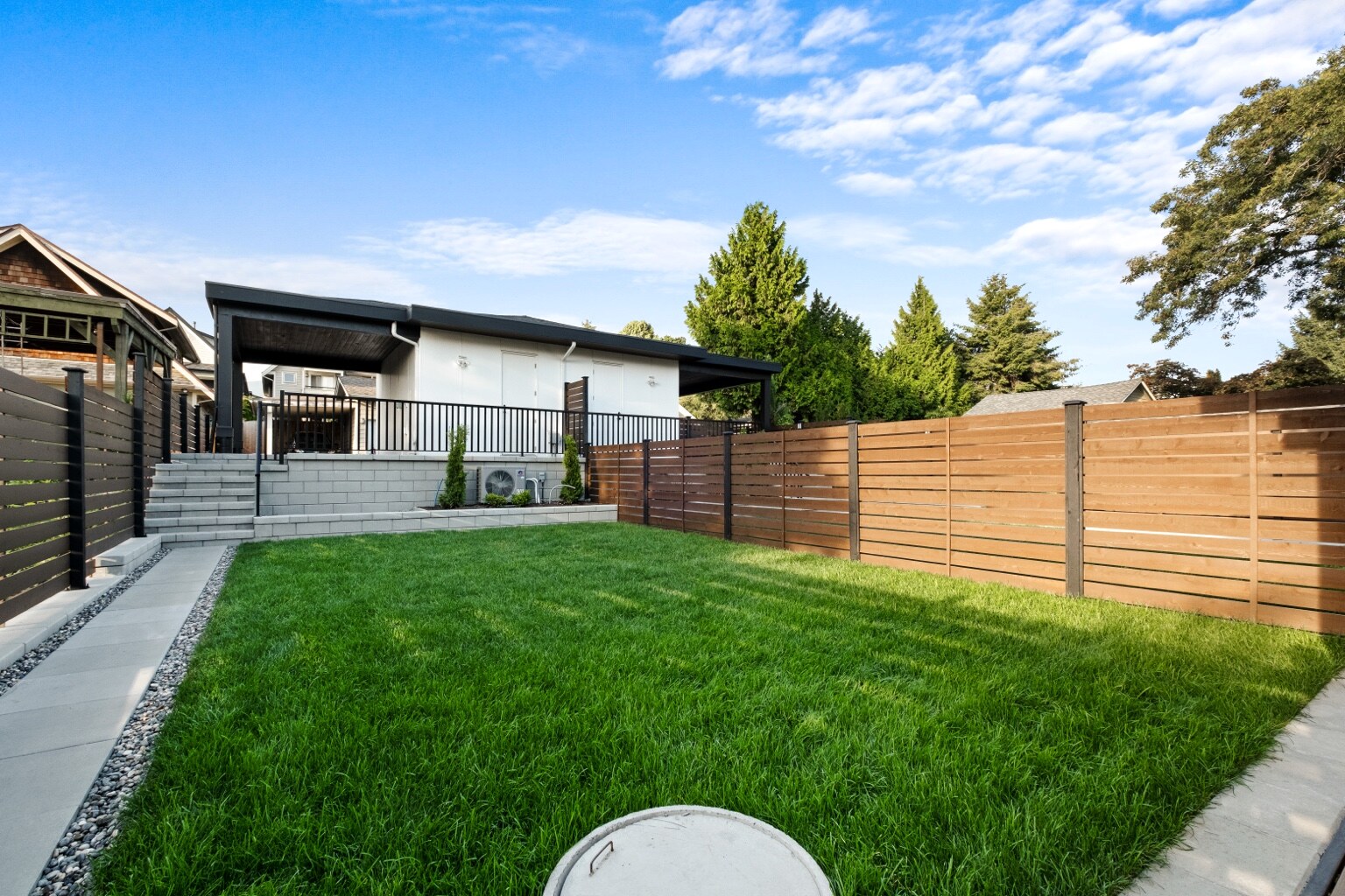 Landscaped backyard and detached accessory building